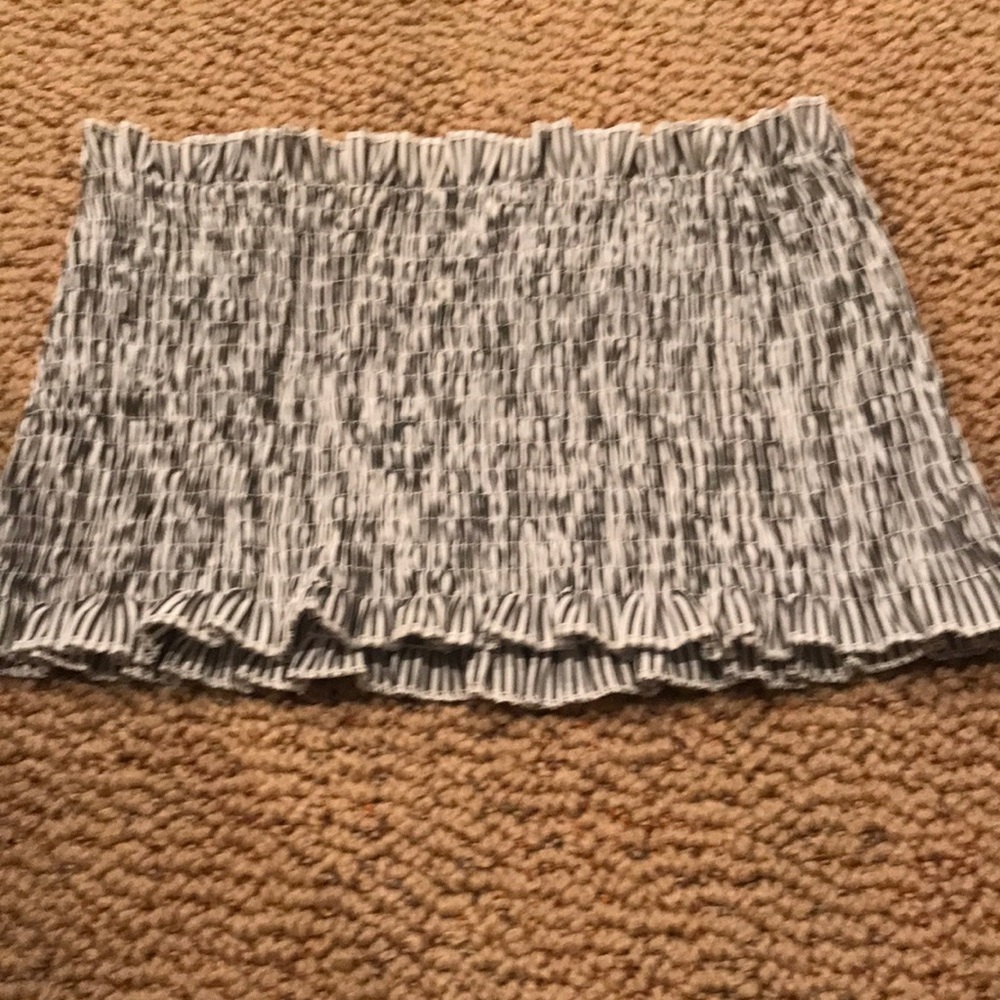 Tube top never worn. White with charcoal gray strip. Size large